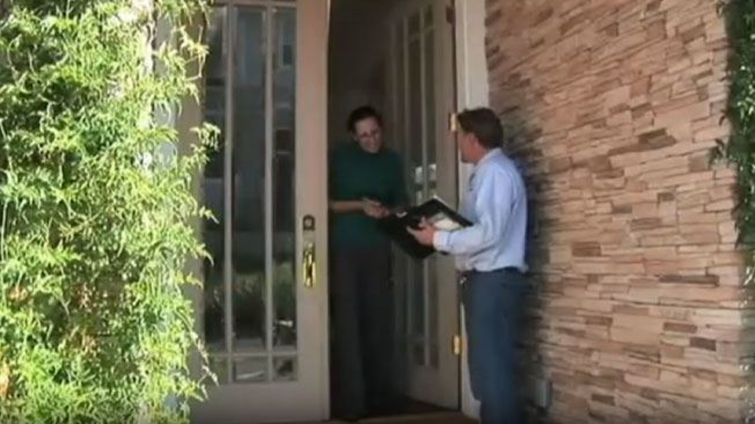 Pest Technician introducing themselves to home owner.